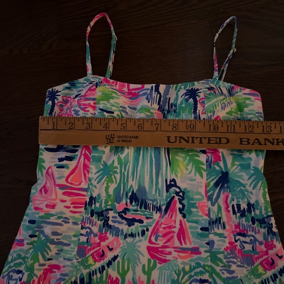 The image shows a Lilly Pulitzer Shelli Stretch Dress in a colorful, abstract pr - Picture 2 of 7